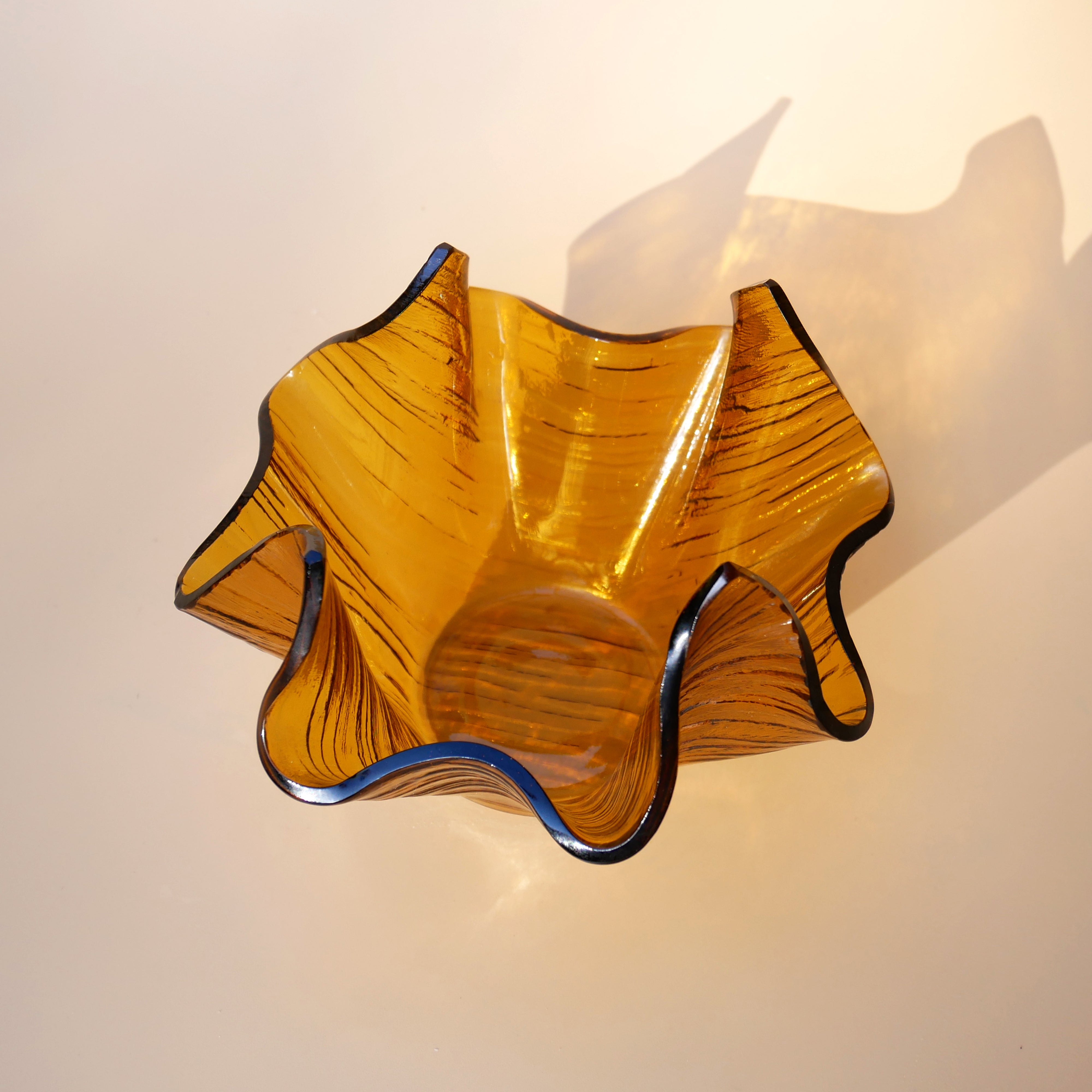 AMBER HANDKERCHIEF SHAPED GLASS DISH