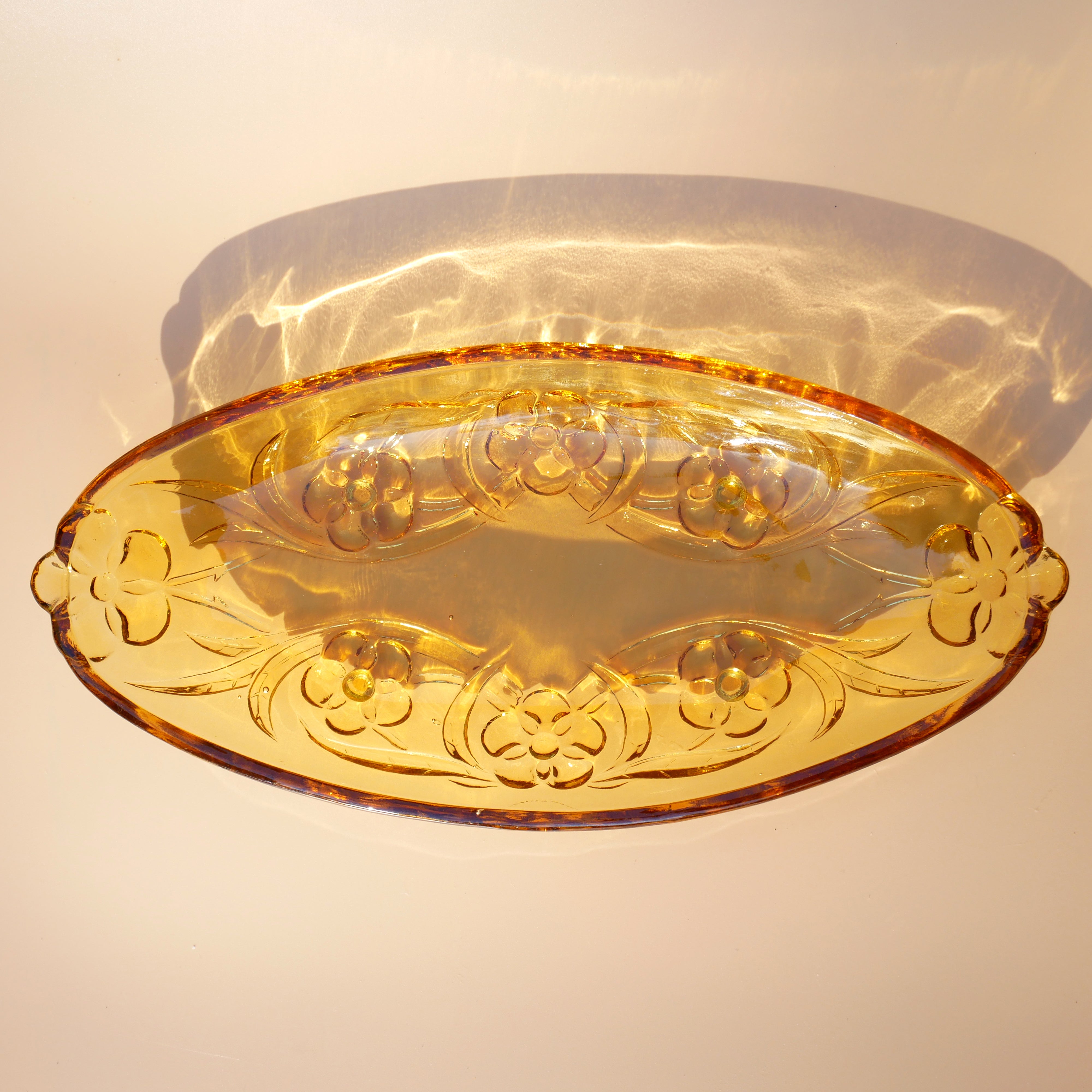 AMBER OVAL FLORAL FORMED GLASS SERVING DISH